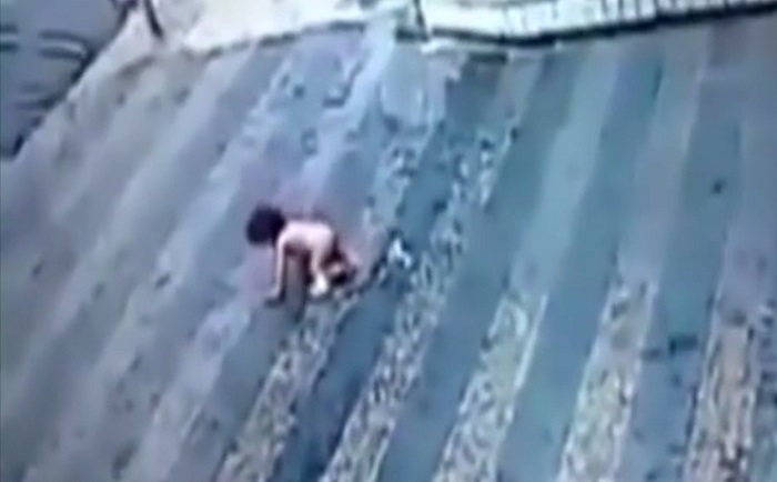 baby survives after falling from building